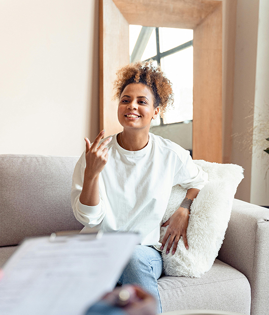 Women smiling and talking